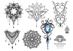 Tilapäistatuointeja, joissa on mandala-motiiveja, suunnitellut tatuointitaiteilija Helene Studio Bläckissä.