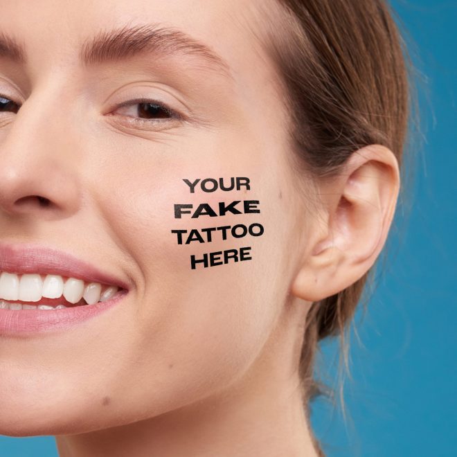 Your Fake Tattoo Here Image on happy womans cheek.